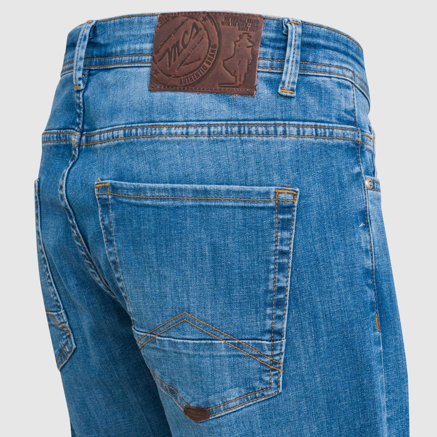 Five-pocket medium dark wash jeans