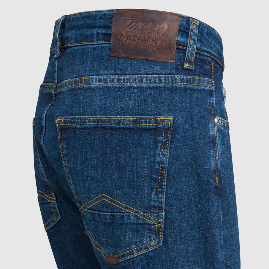 Five-pocket dark denim jeans