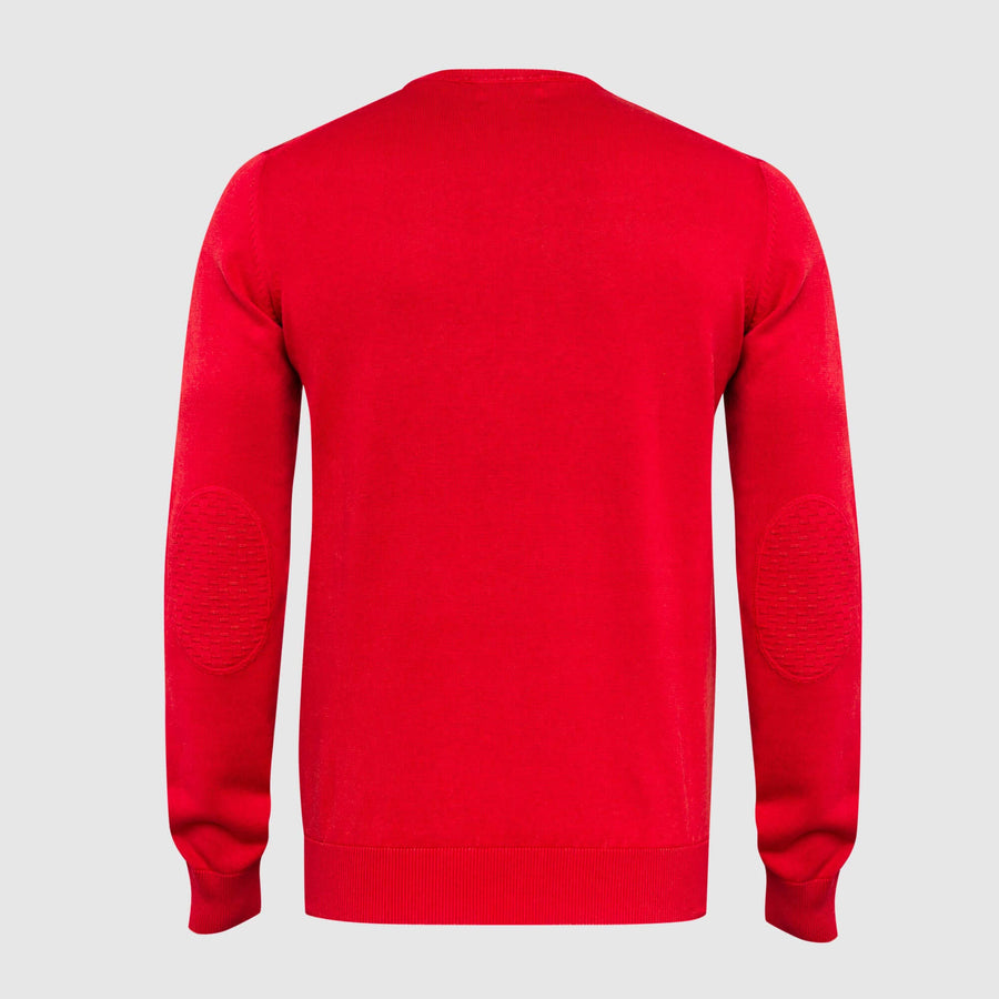 Maglione tinta unita con motivi in rilievo