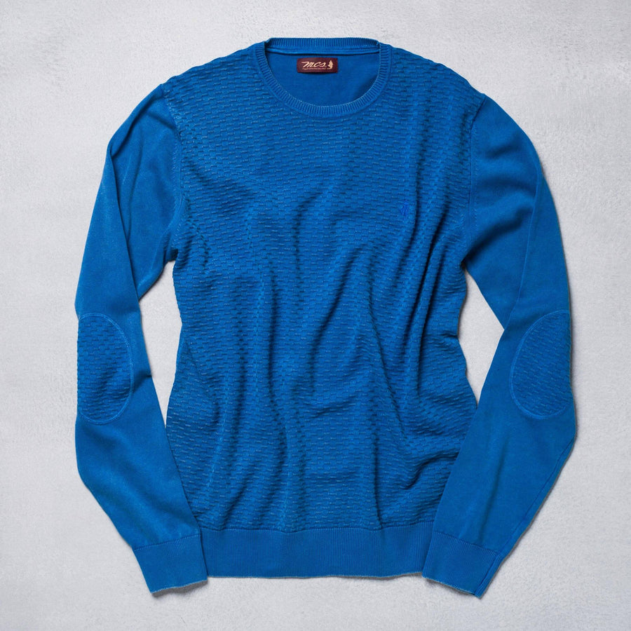 Maglione tinta unita con motivi in rilievo