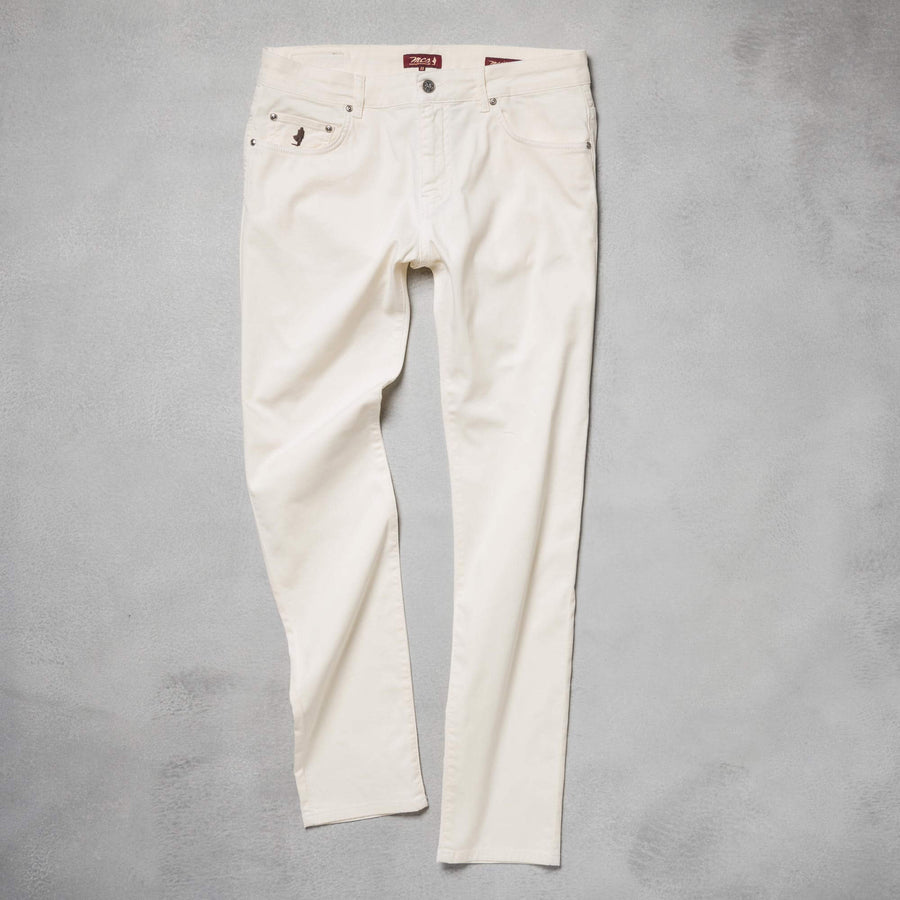 Five-pocket trousers in printed panama cotton.