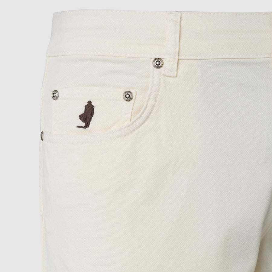 Five-pocket trousers in printed panama cotton.